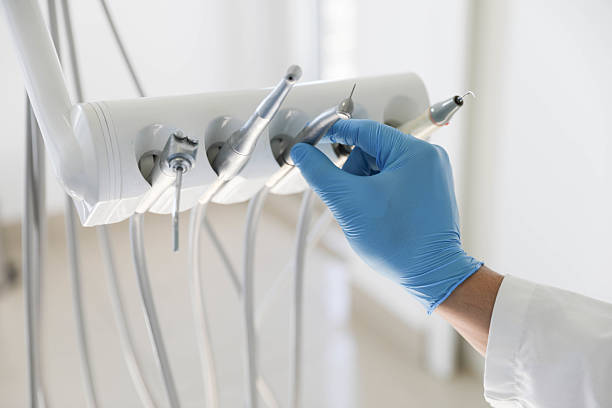 Professional Tooth Extraction technician working in Hillsborough, NC